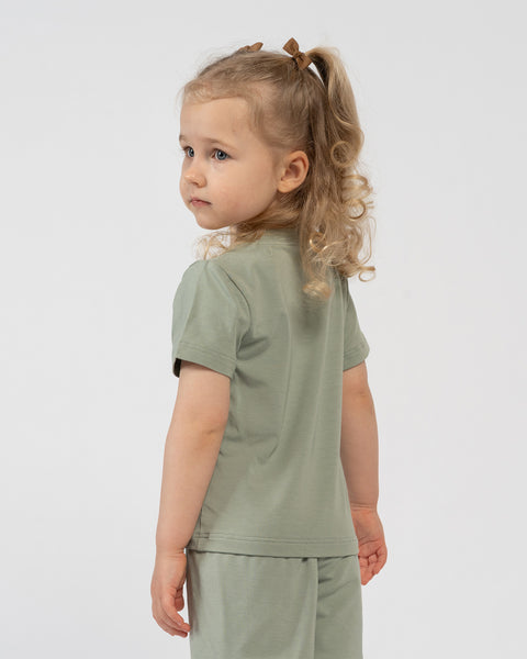 Kids green bamboo t-shirt and shorts set – back view of breathable summer outfit for children