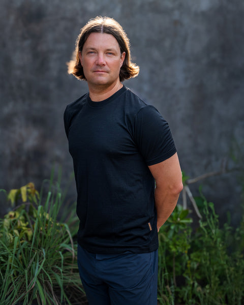 Man wearing regular fit t-shirt from 100% Merino wool in black color