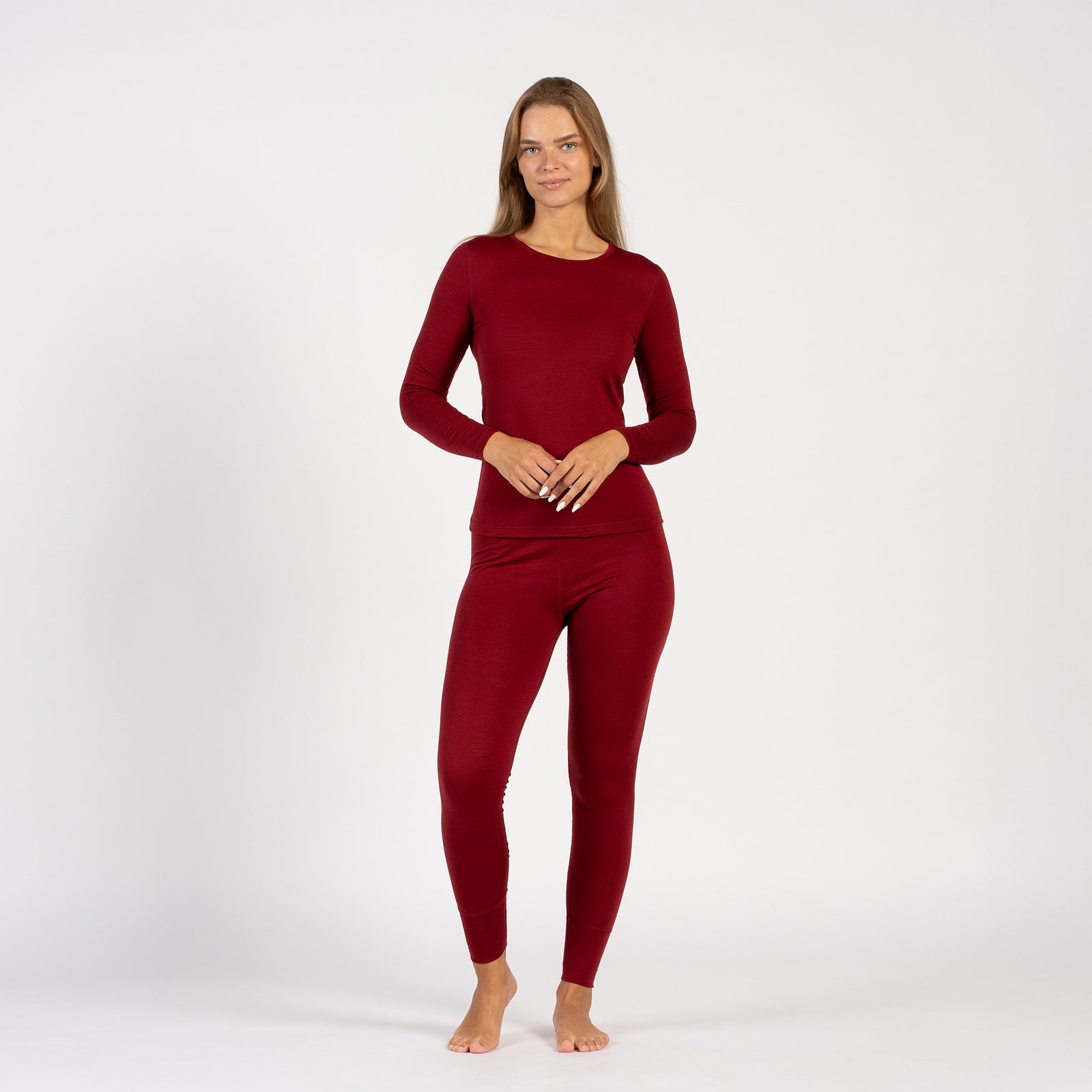 Zijaanzicht van thermische legging van koninklijk kersen Merinowol, met hoge taille.
