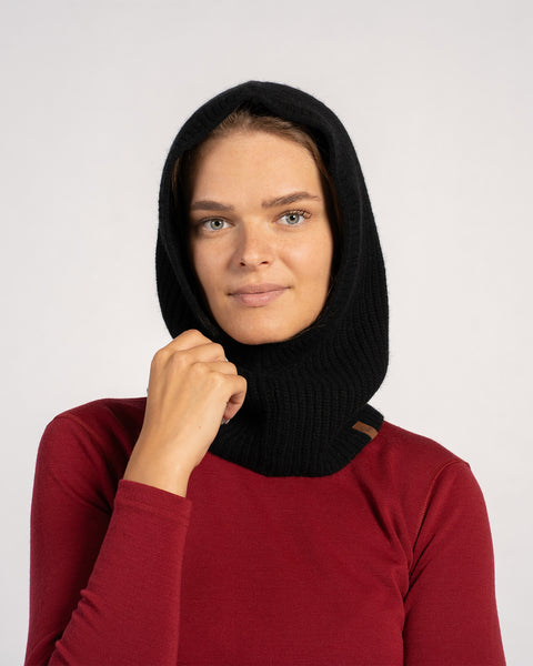 Model wearing black ribbed knit balaclava hood – soft cashmere wool blend for women